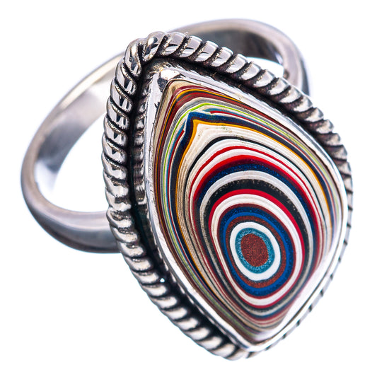Sterling silver teardrop fordite ring with multicolor concentric swirl stone and braided band