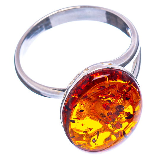 Sterling silver adjustable ring with amber oval cabochon front