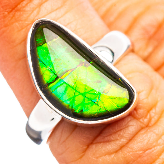 Sterling silver ammolite ring with green iridescent teardrop stone, bezel-set