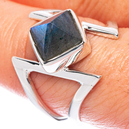 Sterling silver ring showing dark square labradorite gemstone in prong setting