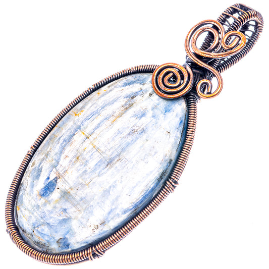 Oxidized copper wire-wrapped kyanite teardrop pendant with spiral bail and blue stone