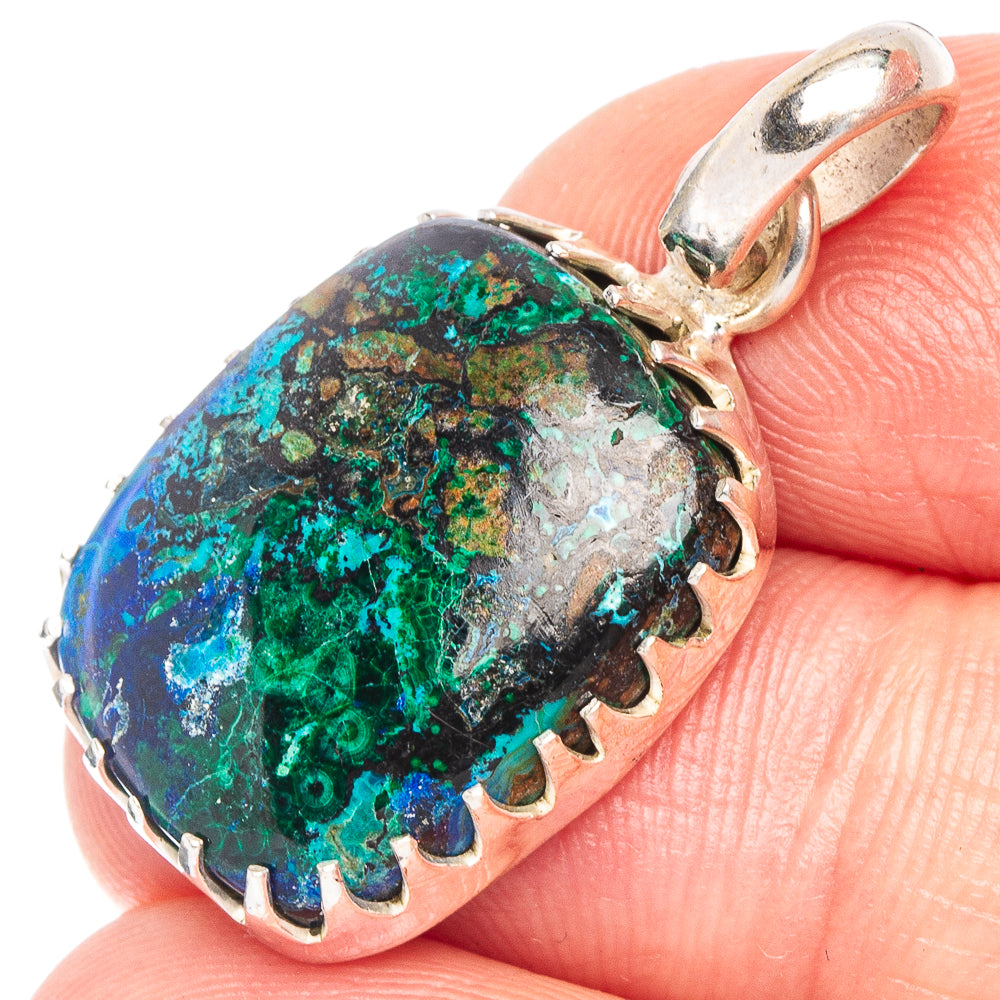 Oval azurite-malachite cabochon pendant in sterling silver bezel, scalloped edge