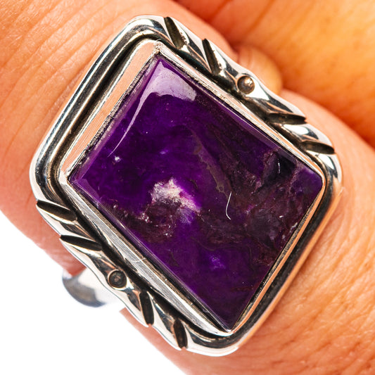 Sterling silver ring with purple rectangular Sugilite gemstone and ornate bezel setting