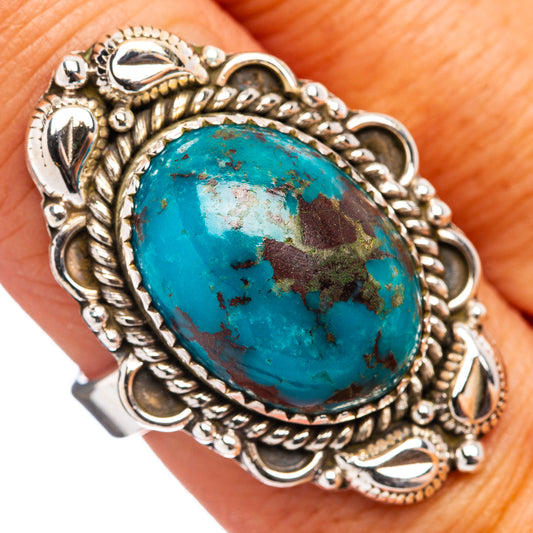 Sterling silver turquoise oval cabochon ring with ornate rope bezel