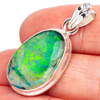Sterling silver opal pendant with oval green-blue iridescent stone and top bail
