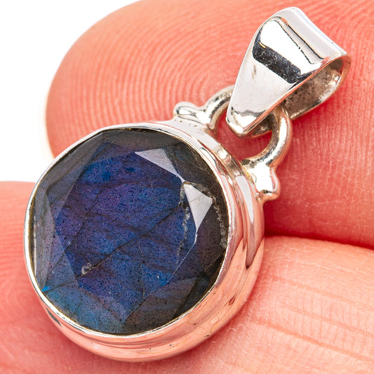 Labradorite pendant in polished .925 sterling silver with faceted dark blue stone