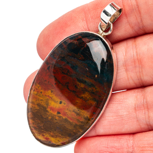 Sterling silver bloodstone oval pendant with mottled red, green, gold stone