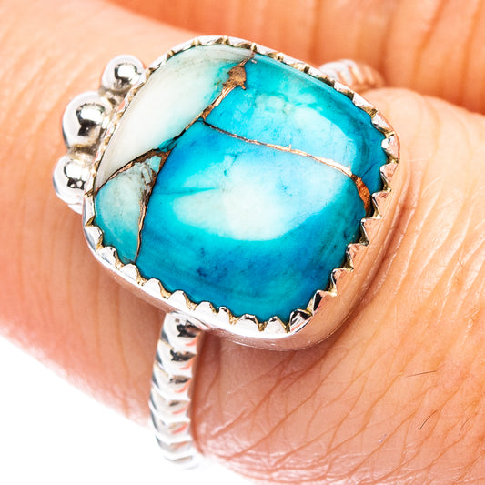 Turquoise oval cabochon ring with .925 sterling silver band, detailed silver bezels