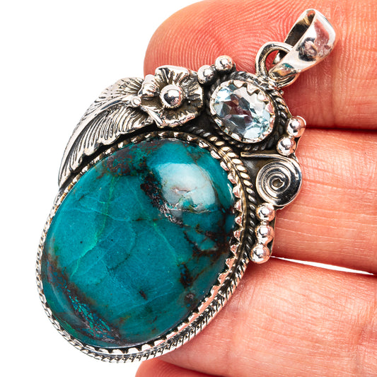 Sterling silver Shattuckite oval pendant with blue topaz accent and bail