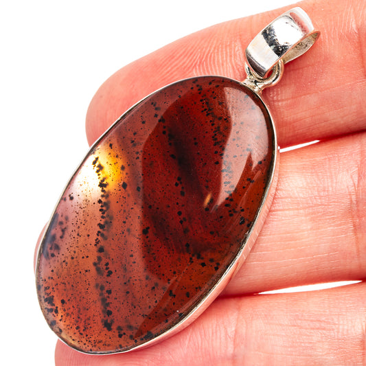 Oval Montana agate pendant in .925 sterling silver, red-brown mottled stone with speckles