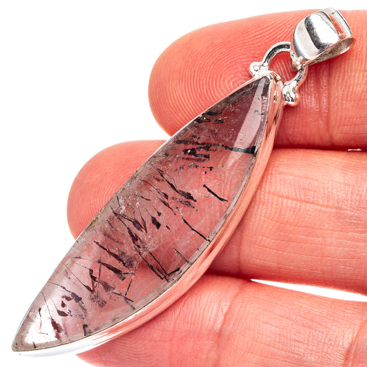 Sterling silver lepidocrocite pendant with close-up teardrop stone, marbled black and red veins