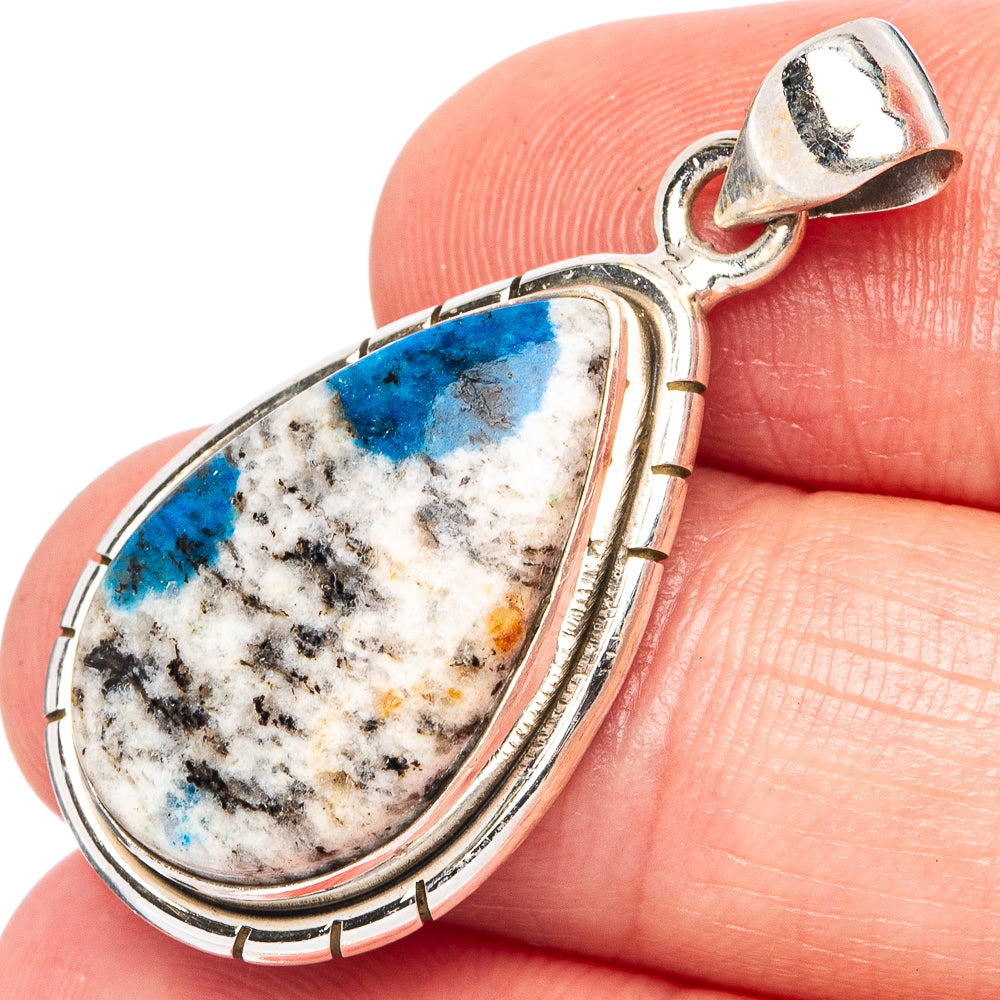 Sterling silver teardrop pendant with blue and white azurite cabochon, ornate bezel