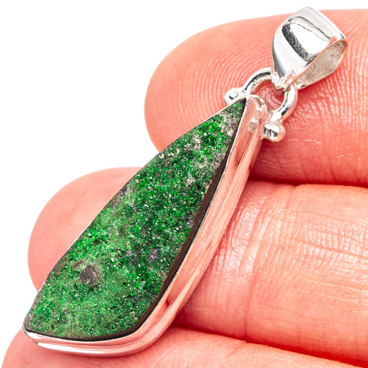 Sterling silver uvarovite pendant with green teardrop stone and side bail