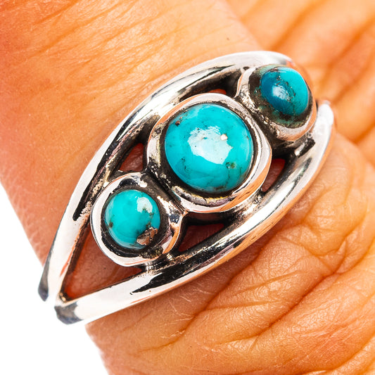 Sterling silver turquoise cabochon ring with oval raised bezel stones