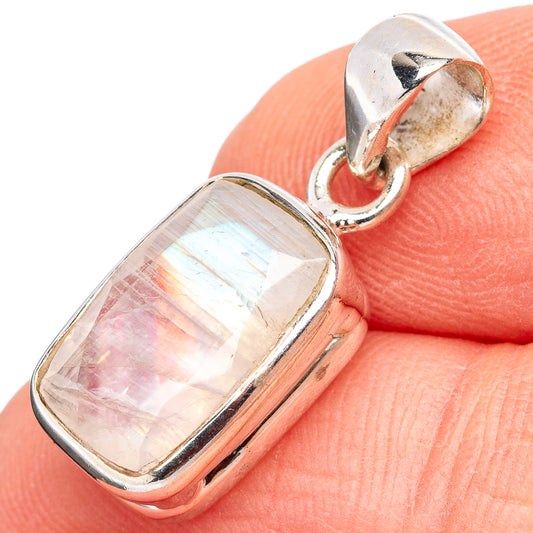 Sterling silver pendant with iridescent rainbow moonstone in rectangular bezel