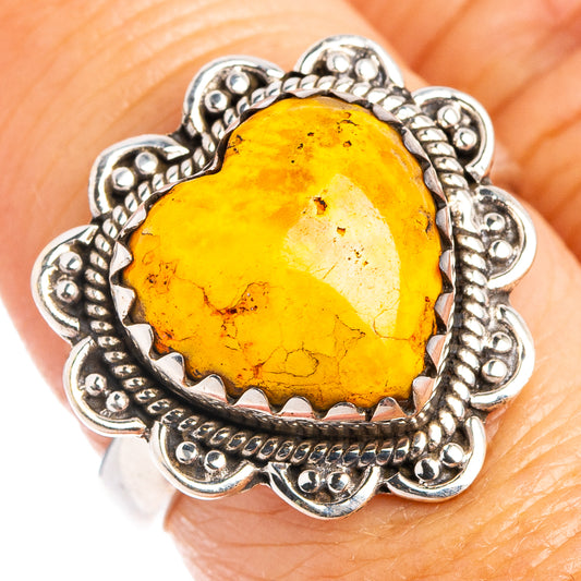 Heart-shaped amber-yellow jasper ring with ornate silver filigree setting