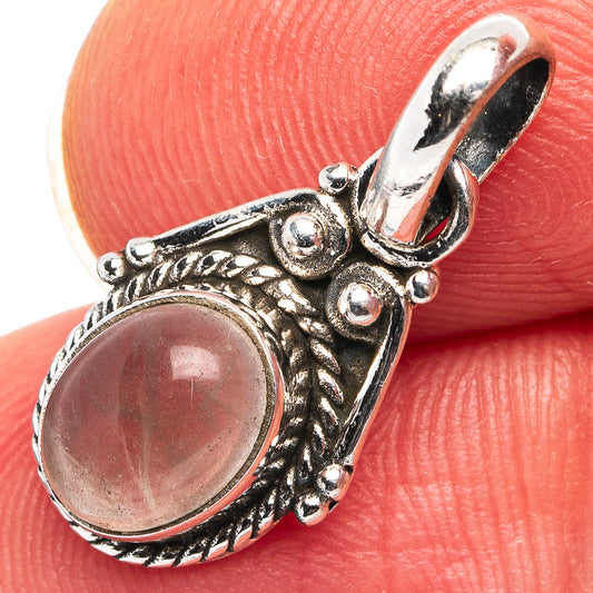 Dainty rose quartz pendant in .925 sterling silver, oval pink cabochon setting
