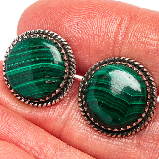 Malachite stud earrings with round green stone cabochons and twisted silver rope borders