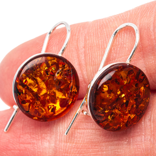 Oval amber drop earrings in .925 sterling silver with fishhook backs, glossy amber