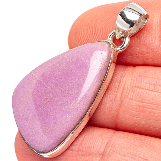 Sterling silver pendant with purple teardrop stone and polished top bail
