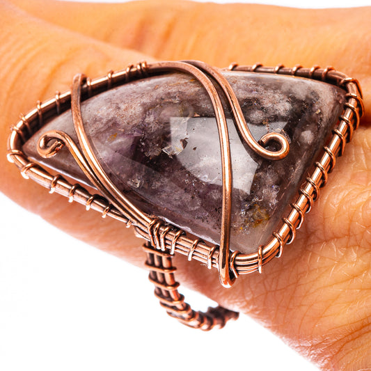 Amethyst wire-wrapped ring in oxidized copper, teardrop stone set in braided band