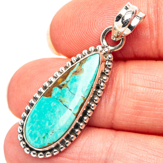 Sterling silver turquoise teardrop pendant with beaded border and loop bail