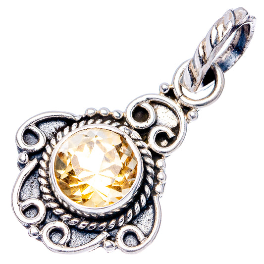 Sterling silver citrine pendant with round yellow-orange stone and leaf-like bail