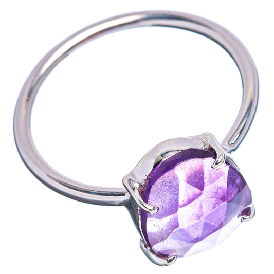 Faceted oval amethyst ring, sterling silver band, side view of prong setting