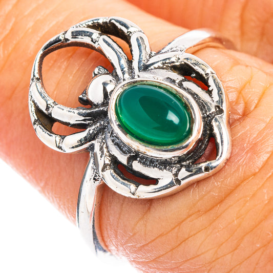Silver spider dainty ring with oval green gemstone, openwork web setting