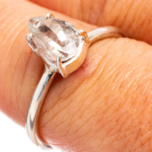 Sterling silver ring with oval clear gemstone in prong setting