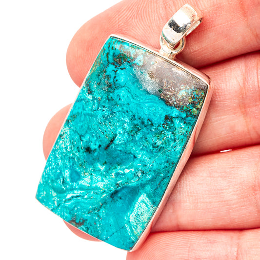 Turquoise shattuckite pendant close-up with .925 sterling silver bail and open bezel