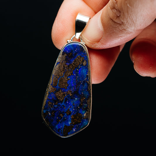 Sterling silver opal pendant with large teardrop blue boulder opal and bail