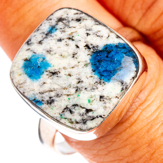 Sterling silver ring with oval blue azurite stone, speckled white and dark matrix