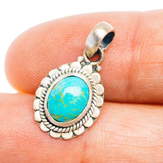 Oval turquoise pendant in .925 sterling silver, rope bezel and bail