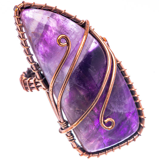 Oxidized copper amethyst ring featuring teardrop purple stone and double-wire scroll details