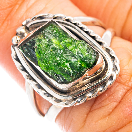 Sterling silver ring with green diopside gemstone, ornate braided border