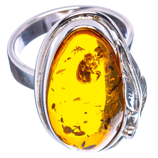 Oval amber leaf cabochon ring with yellow amber in .925 sterling silver frame