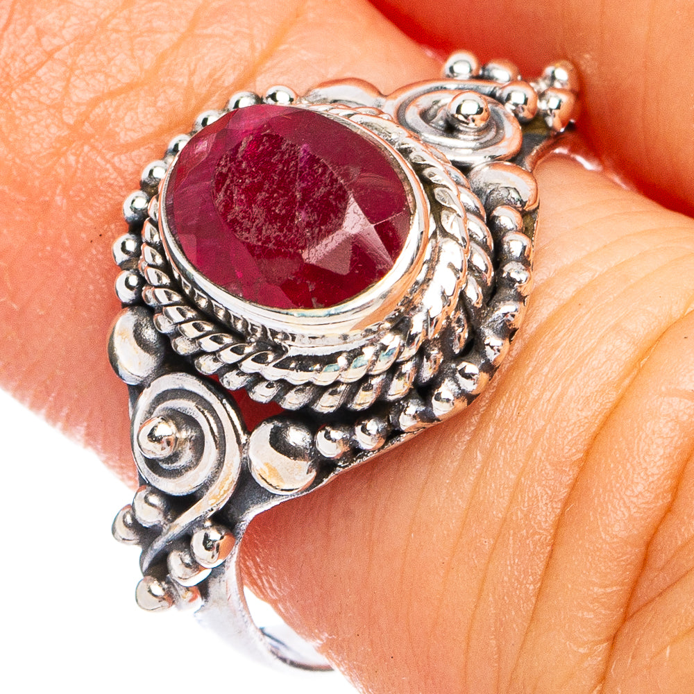 Oval red gemstone sterling silver ring with ornate filigree setting