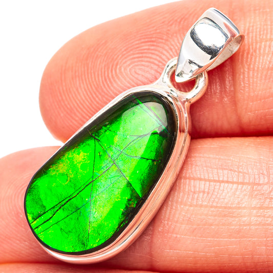 Sterling silver ammolite pendant with green teardrop gemstone and top bail