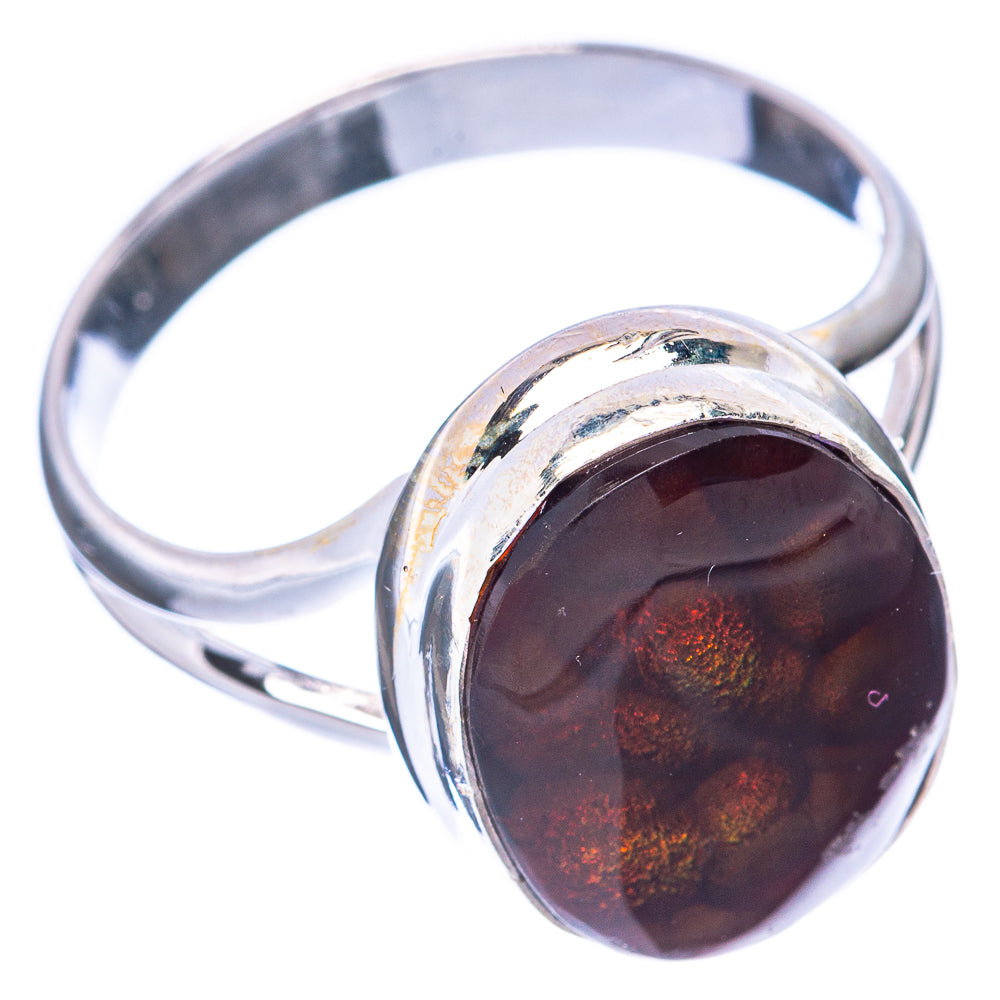 Oval dark fire agate set in polished sterling silver ring with raised bezel