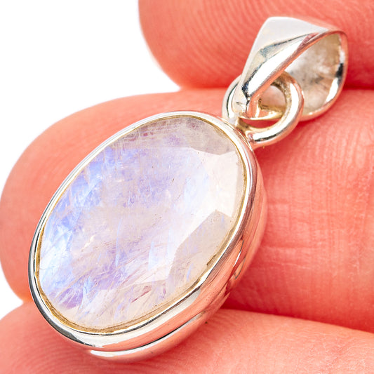 Oval rainbow moonstone pendant in .925 sterling silver, faceted cabochon in oval bezel