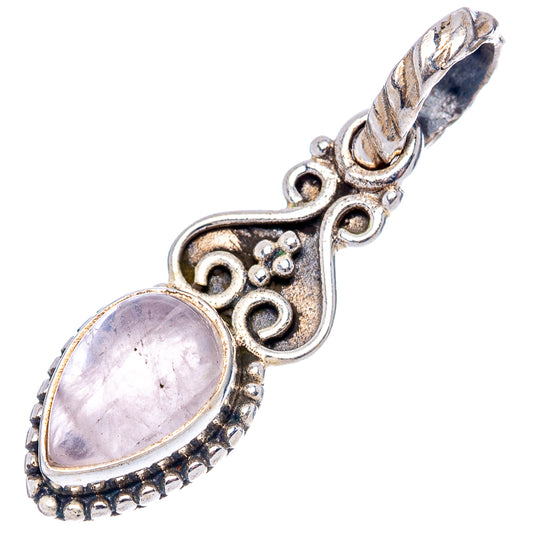 Oval rose quartz cabochon pendant in detailed .925 sterling silver decorative frame