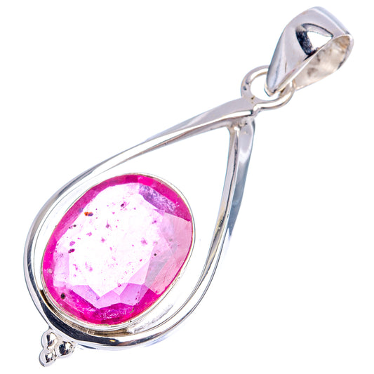 Sterling silver ruby pendant with magenta oval gemstone in a curved teardrop setting