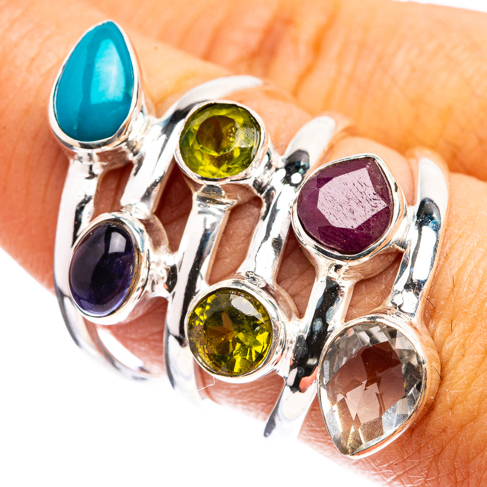 Turquoise oval gemstone ring with round green, purple, and smoky quartz stones, silver