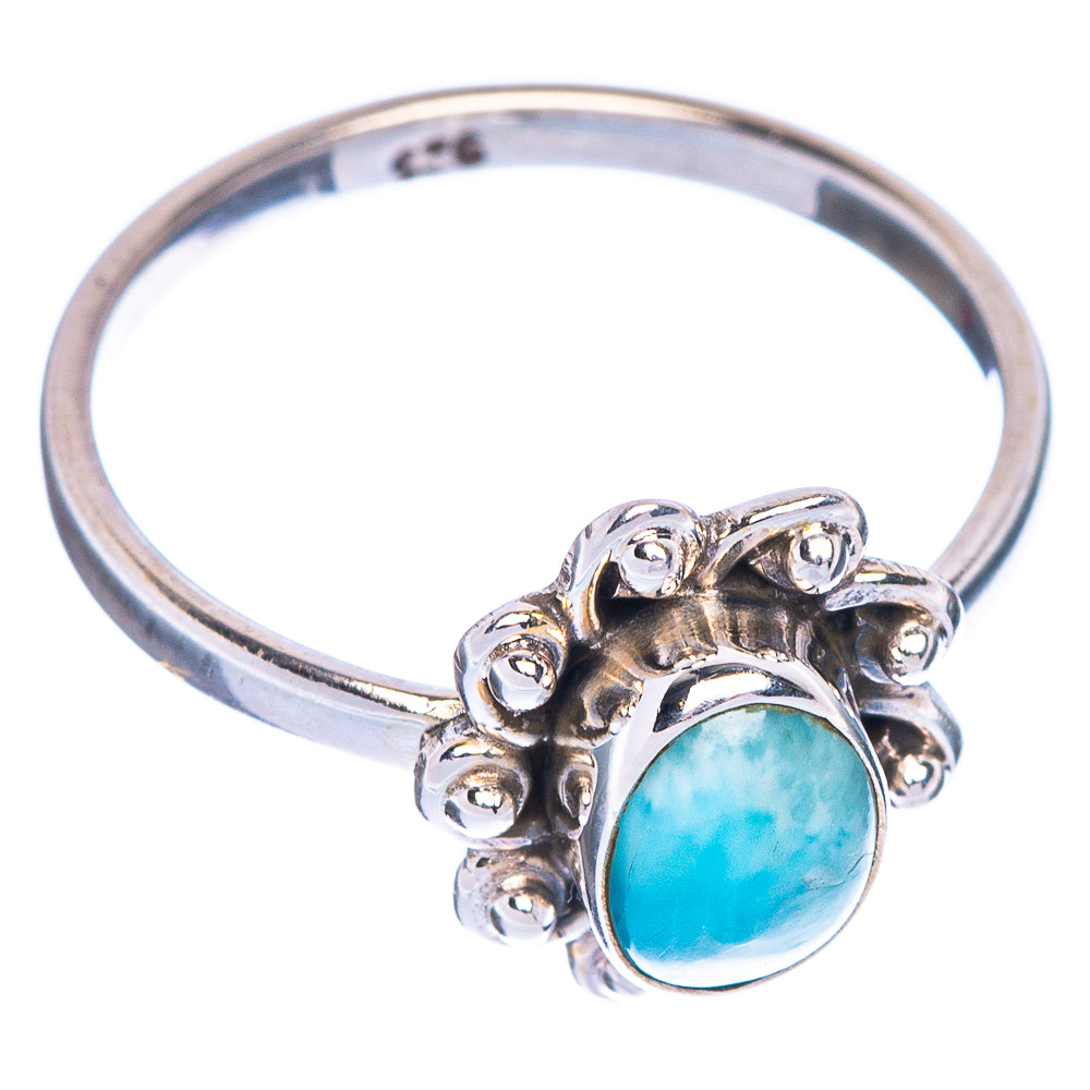 Sterling silver ring with oval Larimar cabochon blue stone and flower-like halo setting