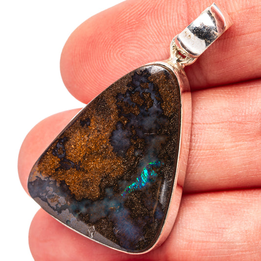 Sterling silver boulder opal pendant with dark blue and gold matrix, teardrop shape