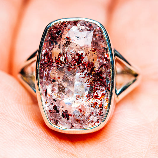 Faceted oval lepidocrocite ring, reddish orange gemstone with prong setting