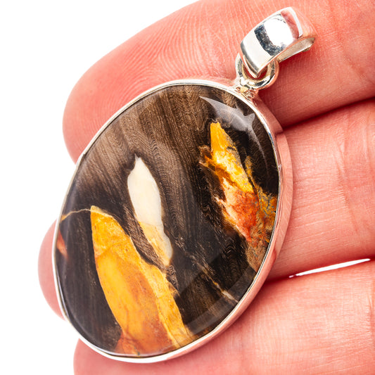 Sterling silver jasper pendant with oval wood-grain cabochon in black and amber
