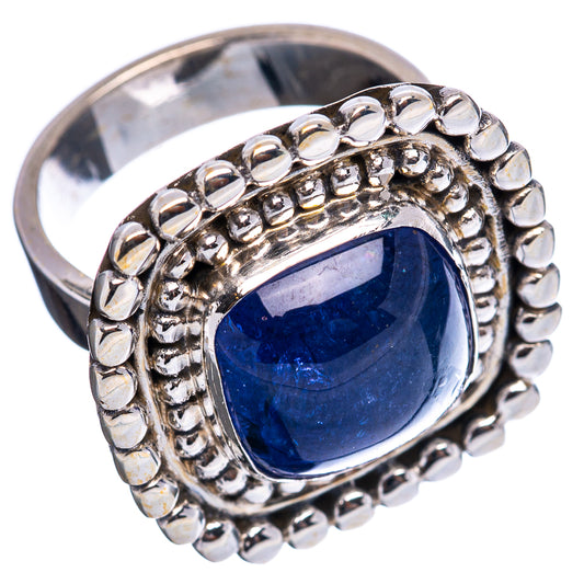 Sterling silver tanzanite ring with oval blue stone and beaded outer band