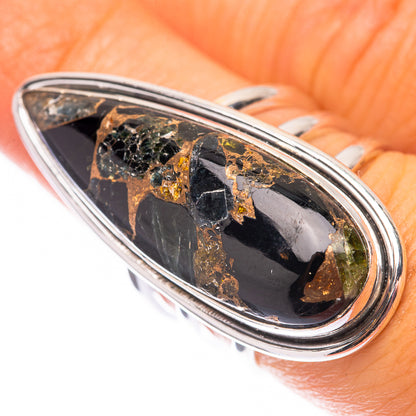 Large oval onyx sterling silver ring with gold-brown stone matrix in bezel